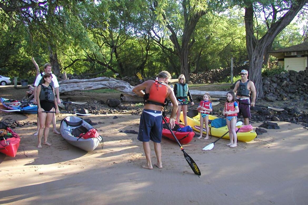 instructors-guide-the-group-in-kayak-tour